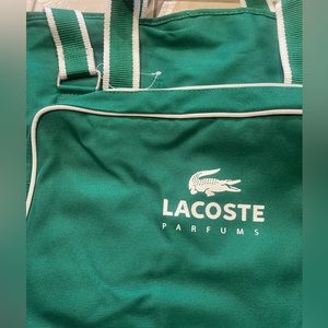 Lacoste Garment Traveling Bag.. Brand New
